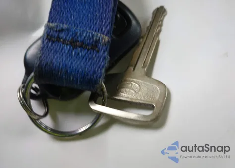 2003 Toyota Corolla Le z USA, uszkodzony, nr VIN JTDBR32E030036896